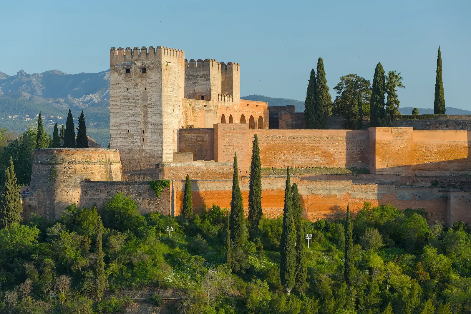 The Alcazaba of the Alhambra seen from the Mirador de San Nicolás, with the mountains behind